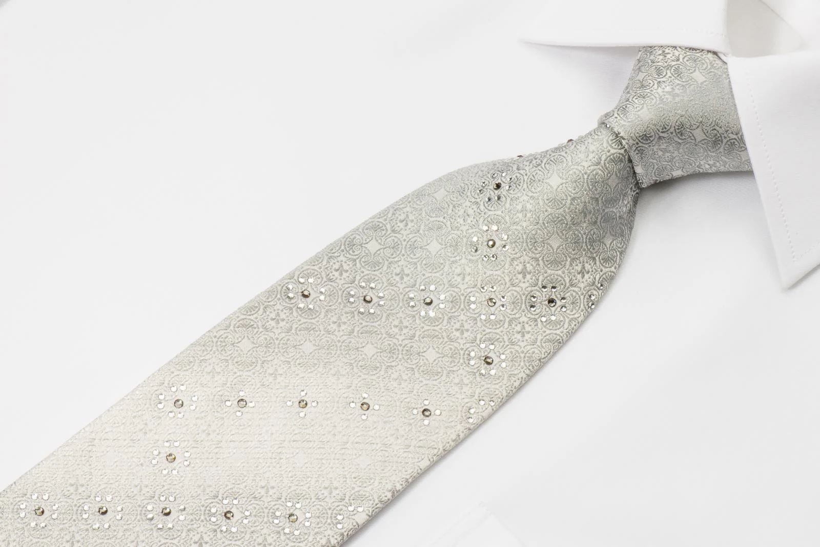 Nina Ricci Mens Rhinestone Silk Necktie Silver Fleur De Lis Motif Design On White